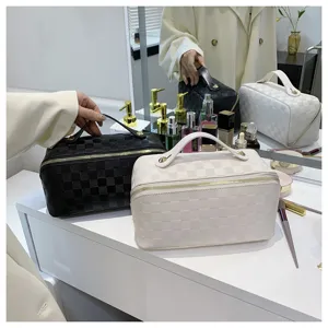 Large capacity checkered cosmetic bag with handle, stylish PU leather vanity travel organizer.