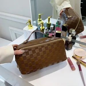 Brown checkered cosmetic bag, large capacity portable makeup organizer for travel and daily use.