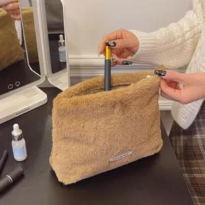 Fluffy plush cosmetic bag for women, large capacity soft makeup pouch, autumn winter zipper handbag.