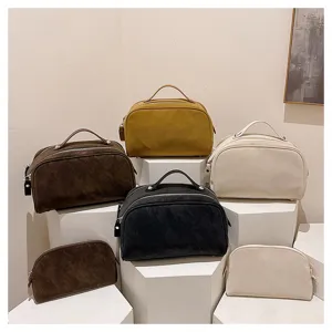 Detail view of vintage cosmetic handbags, multi-color storage pouch set, large capacity design.