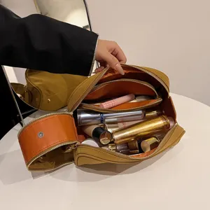 Large capacity retro cosmetic bag with multi-layer storage for daily travel and organization.