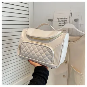 White quilted cosmetic travel bag, PU leather makeup organizer pouch with gold zipper.