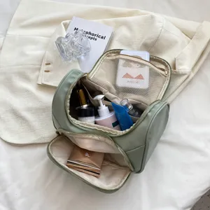 Large capacity green cosmetic bag, portable travel toiletry storage organizer for women.