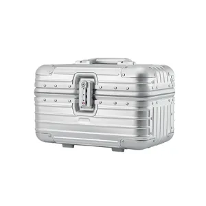 Silver aluminum makeup case with TSA lock and classic groove design for professional use and storage.