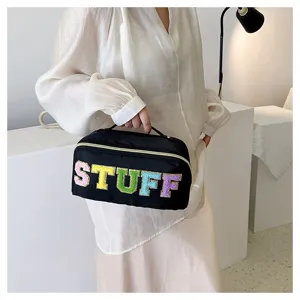 Black nylon cosmetic bag with colorful fluffy letters STUFF, large capacity travel makeup pouch.