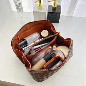 Large capacity diamond PU leather cosmetic bag, portable opening makeup organizer for travel.