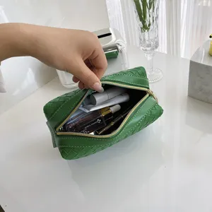 Green woven leather cosmetic bag portable clutch makeup organizer soft pouch for women daily use