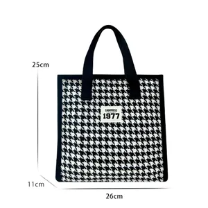 Black and white houndstooth cosmetic bag, large capacity travel makeup storage handbag.
