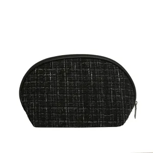 Black and white tweed cosmetic bag, half-moon portable makeup organizer for travel use.