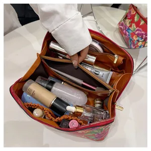 Detailed view of large capacity Chinese style floral PU leather cosmetic bag interior view.
