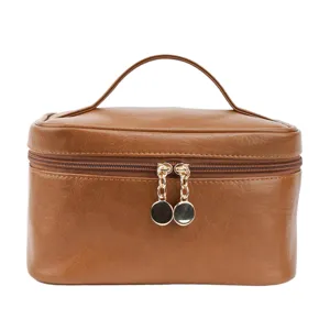 Brown PU leather cosmetic bag, large capacity portable makeup storage pouch and toiletry organizer.
