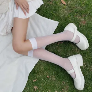 White polka dot mid-calf socks for women, cute JK style sweet fashion daily casual wear.