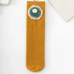 Cute girls ribbed mid-calf socks featuring lovely floral embroidery and delicate lace trim.