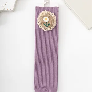 Girls purple ribbed mid-calf socks featuring delicate embroidered flower and lace trim cute style