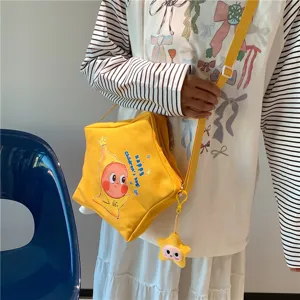 Children yellow star crossbody bag cute cartoon print canvas shoulder bag for kids daily use.