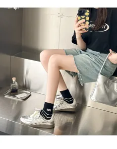 Fashion casual mid-calf cotton socks with stylish stripes and cute embroidery for daily wear.