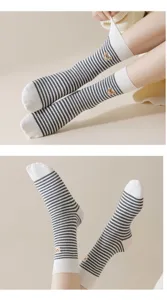 Women's cute cartoon bear embroidered mid-calf socks with classic striped cotton design.