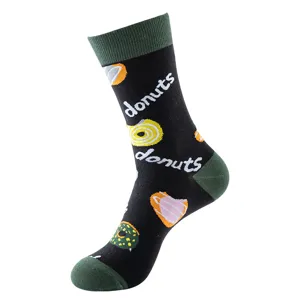 Zwarte katoenen sokken met groene rand en leuk donutpatroon, klassiek casual unisex design.