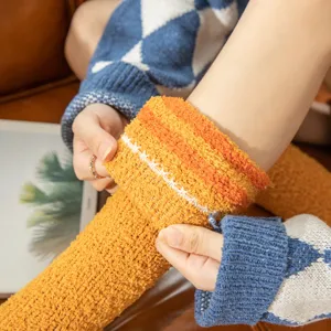 Cozy coral fleece knee high socks with double stripes, warm Japanese style home socks for women.