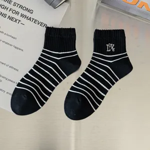 Black and white striped cotton mid-tube socks with cute Love embroidery for women and girls daily.