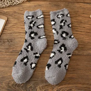 Thickened coral fleece cozy winter socks for women, warm fuzzy sleep socks with cute pattern.