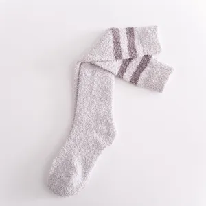 Cozy coral fleece knee high socks for women, cute two stripe fuzzy long socks for winter warm home wear.