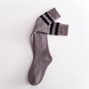 Coral fleece women winter warm knee high socks with two black stripes cozy home wear.