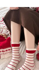 Cozy winter red and white striped long socks, thick warm cotton knit socks for women daily wear.