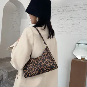 Retro leopard print underarm shoulder bag for women, chic vintage style minimalist design.