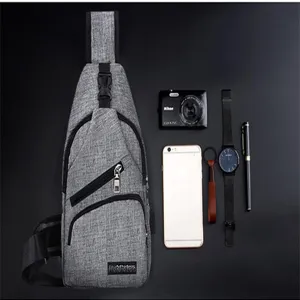 Men's casual canvas sling bag, multi-pocket crossbody chest pack for outdoor sports.