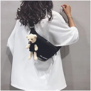 Black canvas chest bag for women, cute plush bear pendant, casual student crossbody sling bag.