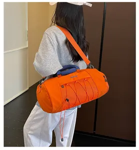 Large capacity cylindrical sports fitness duffel bag for travel, gym, yoga, and outdoor activities.