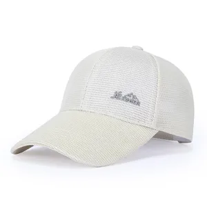 Close-up detail of breathable beige mesh baseball cap front embroidery and visor design.