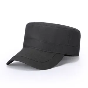 Detailed view of the black cotton flat top cap, showing neat stitching and structured brim.
