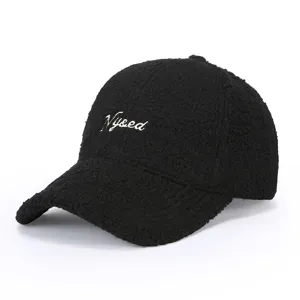 Black teddy fleece baseball cap with white embroidered letters, cozy autumn winter hat.
