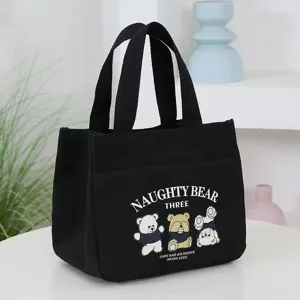 Black canvas tote bag with cute cartoon bear print, spacious lunch bag for daily use.