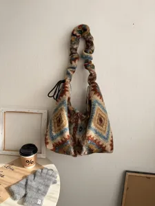 Retro ethnic plush tote bag for women, cozy winter geometric shoulder bag with adjustable strap.