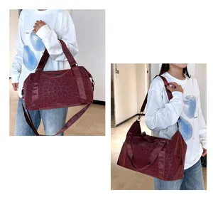 Large capacity travel duffel bag in wine red leopard print, stylish fitness luggage bag for women.