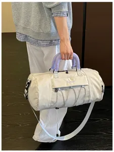 Large capacity gym duffel bag with wet dry separation for swimming, fitness, and short travel.