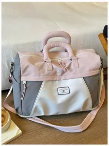 Große Reise-Duffeltasche, erweiterbare Fitness-Sporttasche, stilvolles Rosa-Grau-Design.