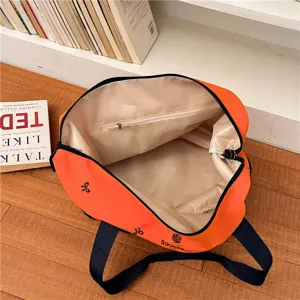 Large capacity orange travel duffel bag, stylish gym tote bag for women daily outdoor use.