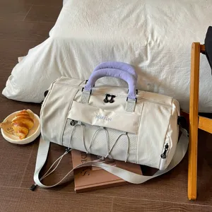 Large capacity gym duffel bag with shoe compartment for travel and sports fitness wear.