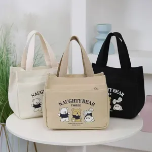 Canvas tote bag with cute cartoon bear print, large capacity lunch bag for daily commuting.