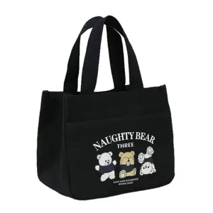 Black canvas tote bag with cute cartoon bear print, large capacity lunch bag for women daily use.