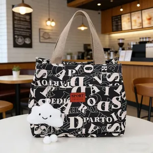 Canvas lunch bag with letter print and cute cloud pendant, perfect for daily office meals.