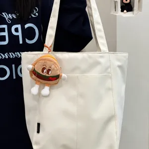 Minimalist casual canvas tote bag for women, large capacity solid color shoulder bag.