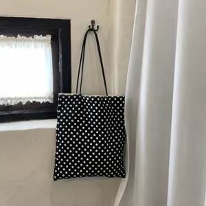 Black and white polka dot canvas tote bag, minimalist vintage shoulder bag for women daily commute.