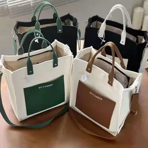 Casual canvas tote bag with contrast pocket, stylish crossbody handbag for daily use.