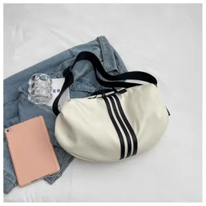 Casual soft shoulder crossbody bag with sporty three stripes detail for daily travel and leisure use.