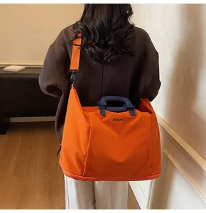 Large capacity expandable travel fitness bag, waterproof messenger sports bag for short trips.